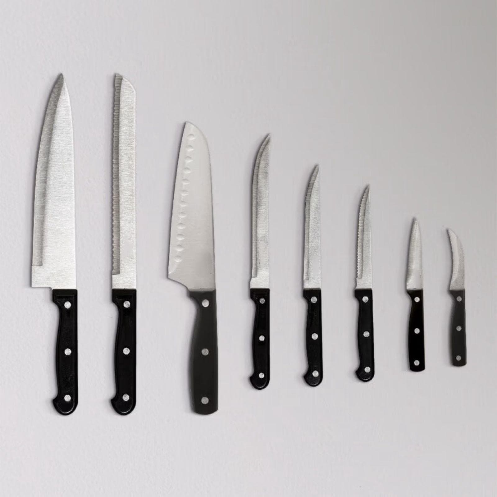 Coltello spelucchino in acciaio inox forgiato cromo e manico nero - Groom