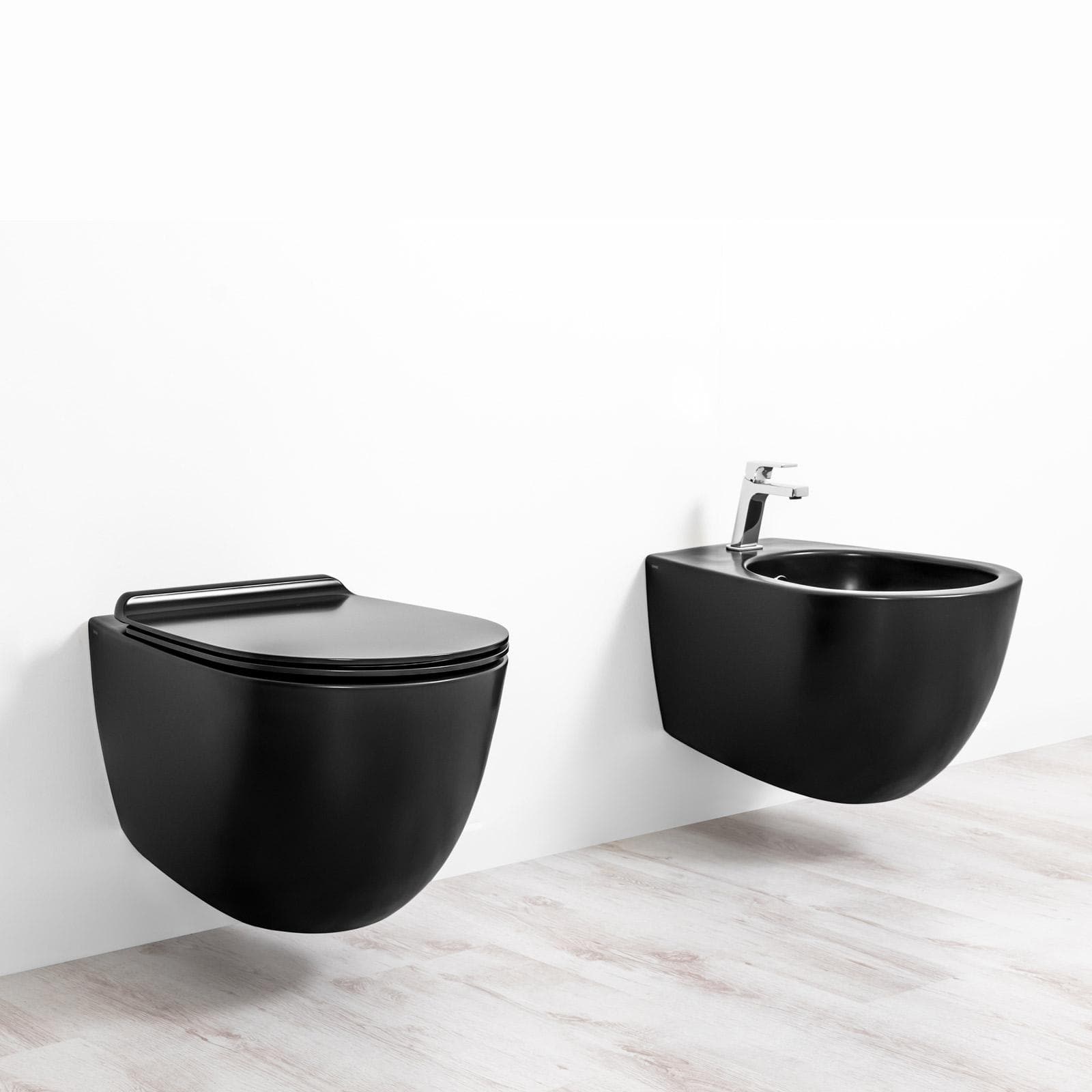 Coppia di sanitari sospesi opachi bidet + wc + sedile 56 cm nero opaco - Vignoni di Simas