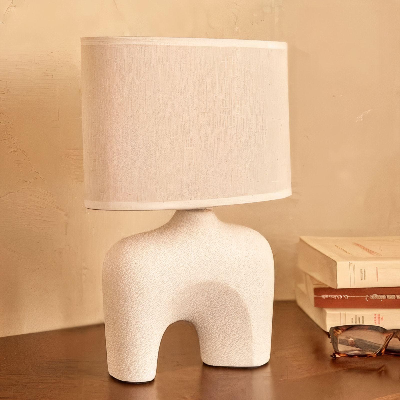 Lampada da tavolo 32h cm ovale in ceramica bianco effetto pietra