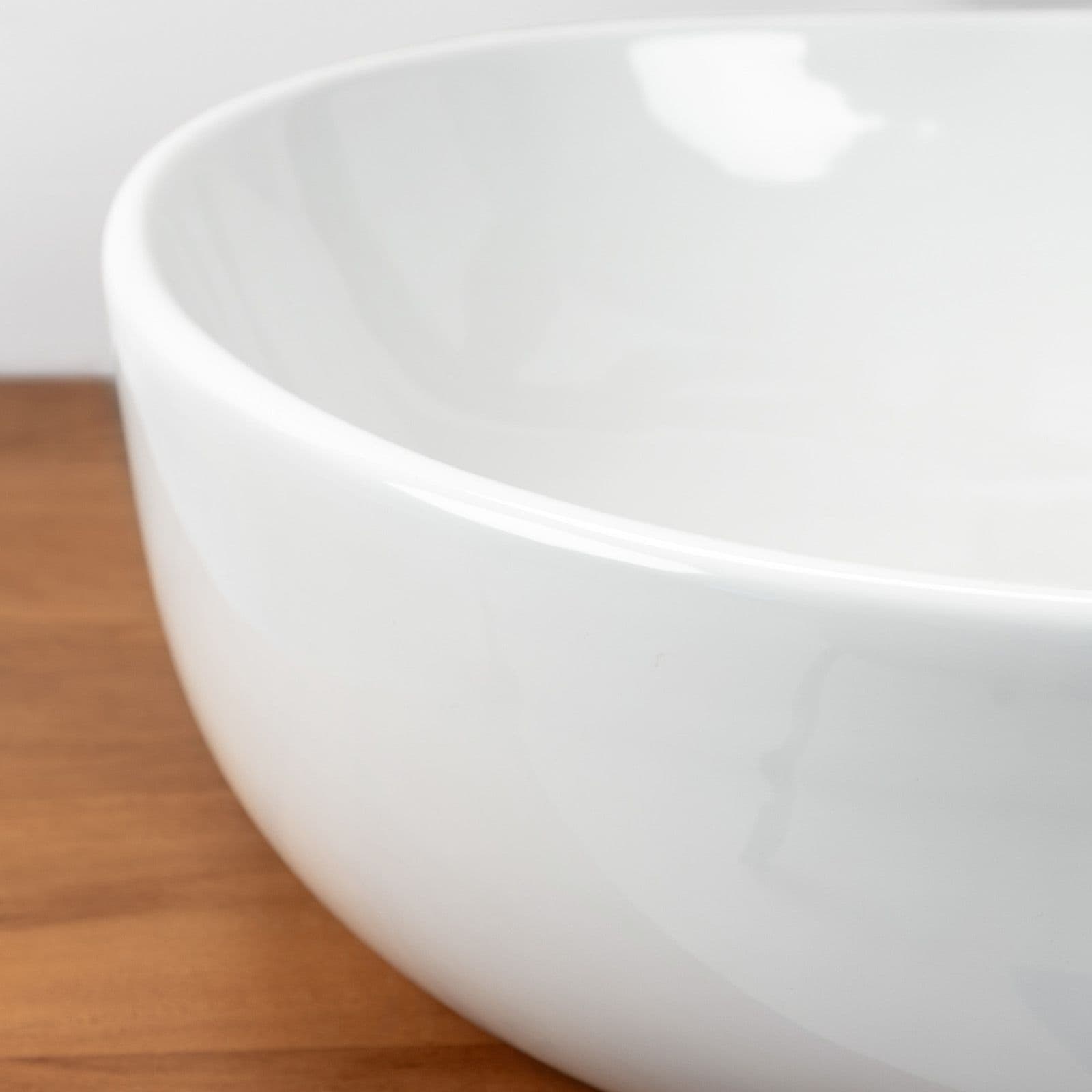 Lavabo d'appoggio ovale in ceramica 60x42 cm bianco lucido - Cloe