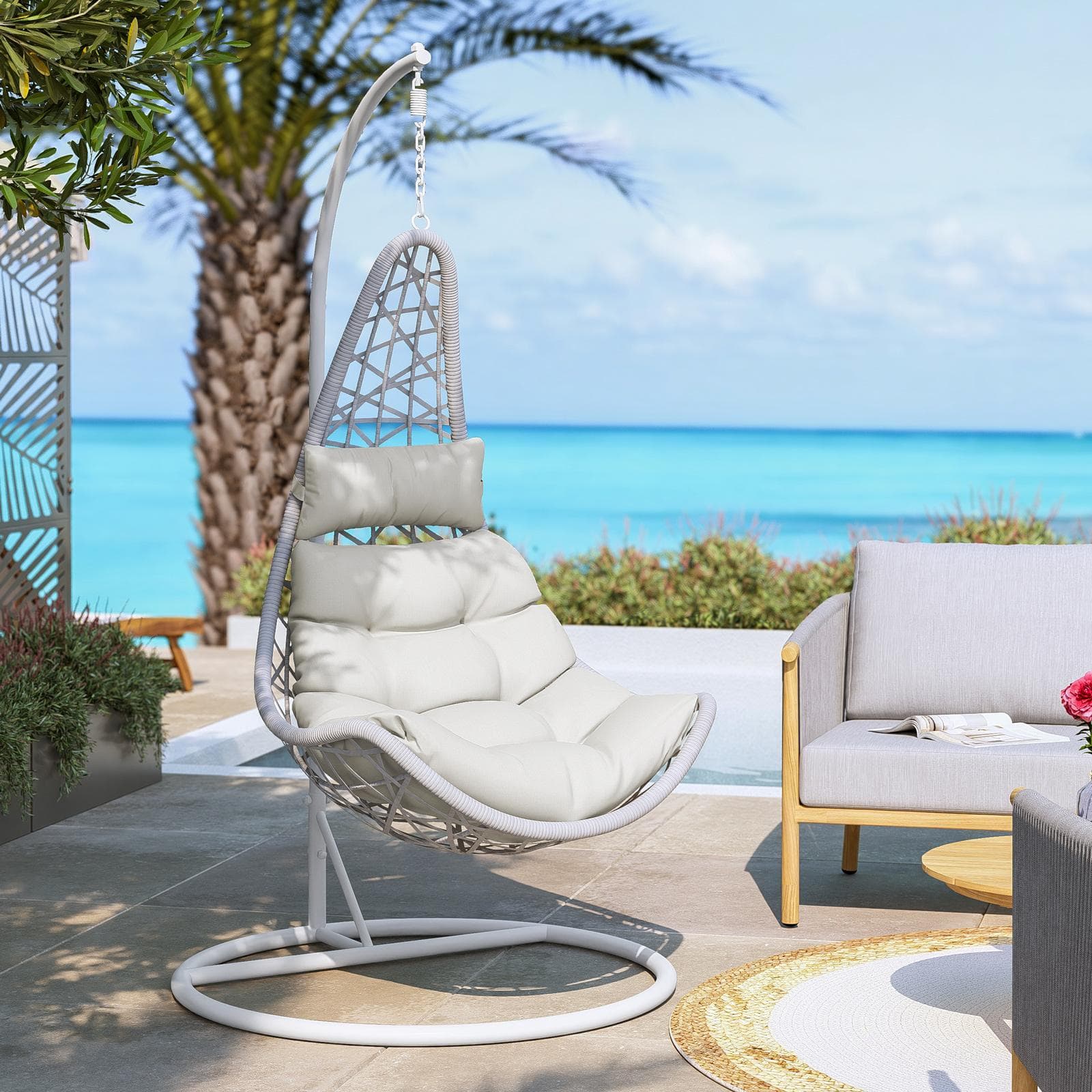Poltrona sospesa in polyrattan bianco con cuscini panna - Duna