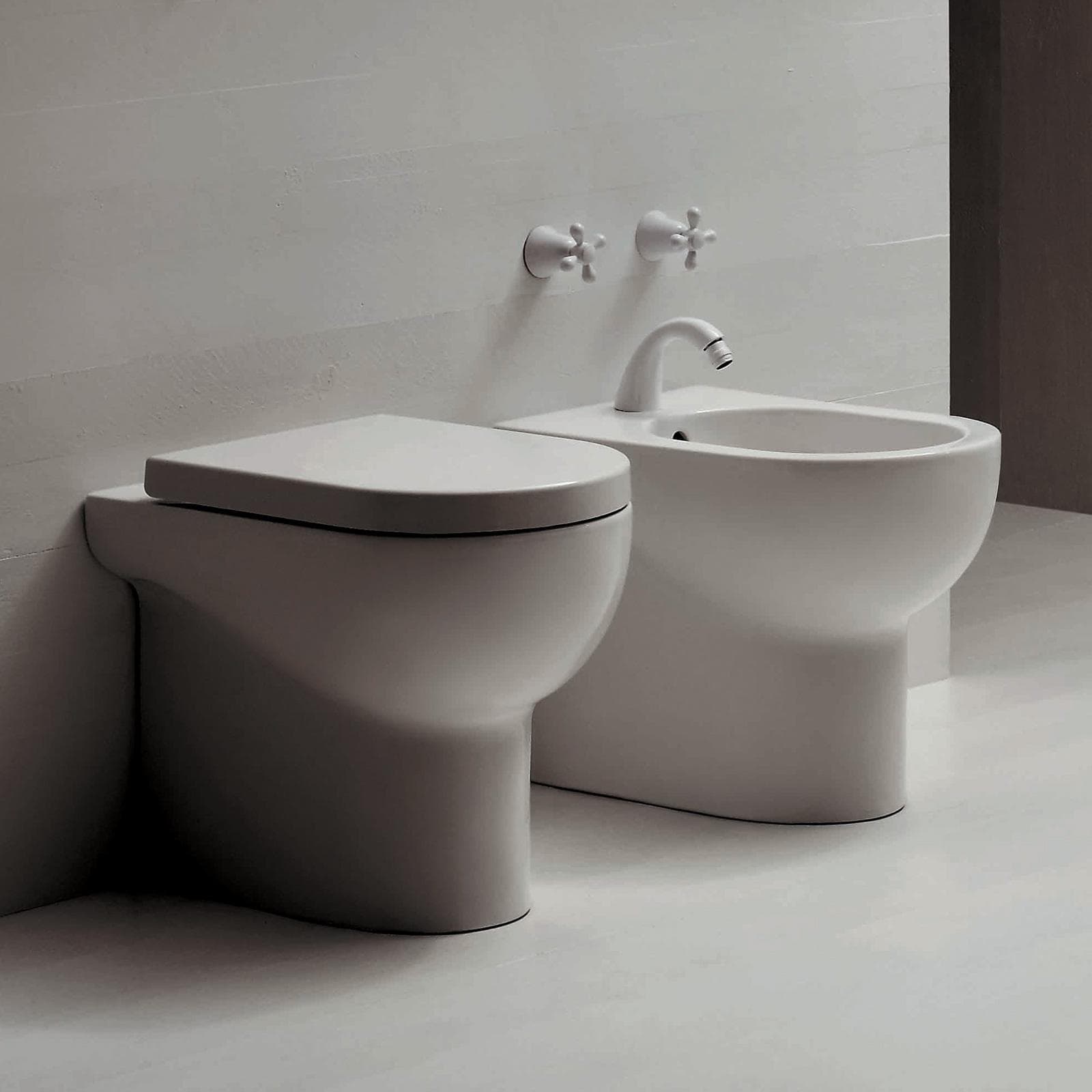 Sanitari AZZURRA con vaso scarico traslato con sedile e bidet - Nuvola