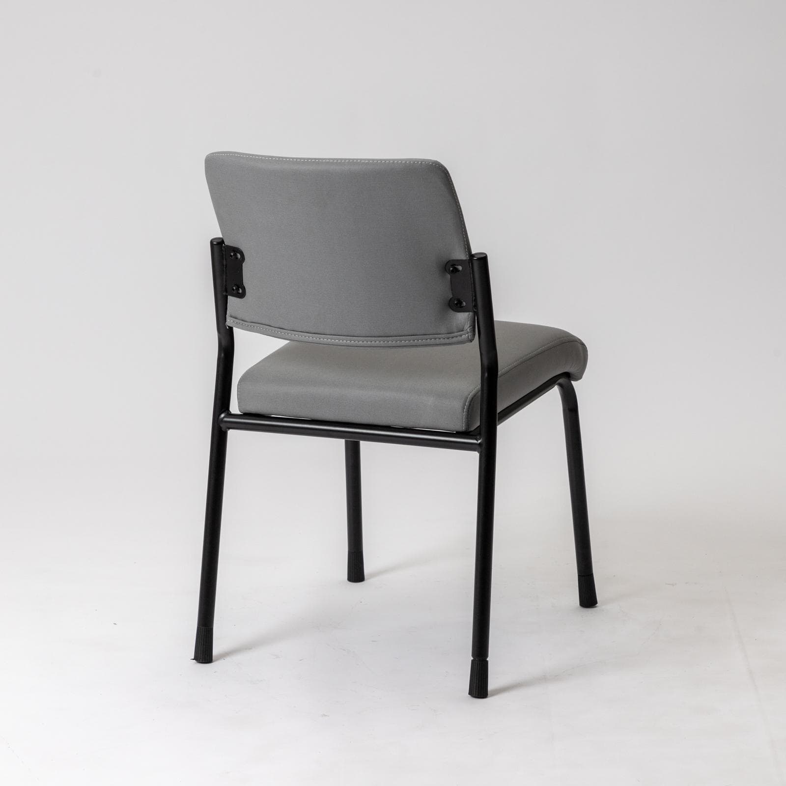 Set 4 sedie da ufficio imbottite in tessuto grigio e gambe in metallo nero - Gomez