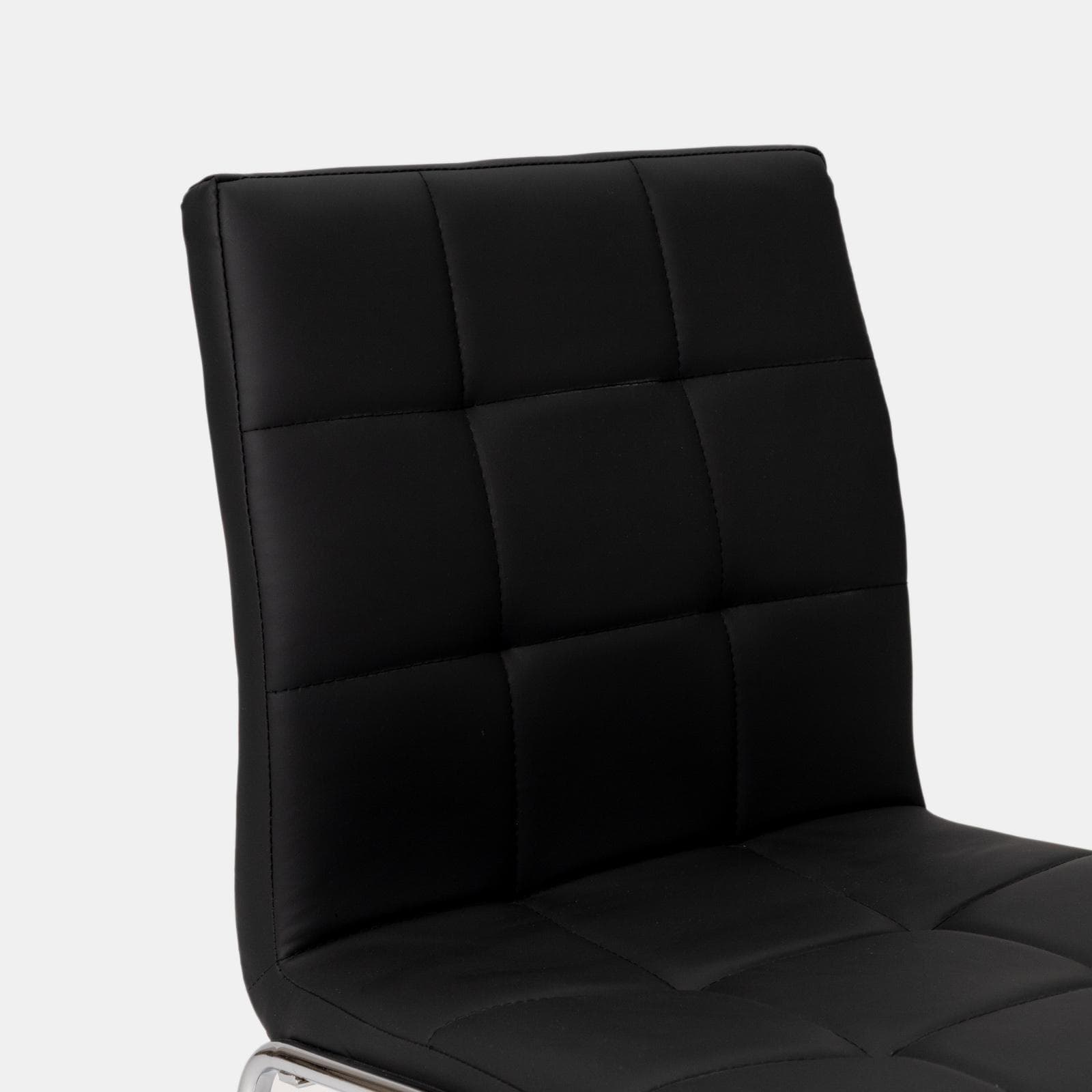 Set 4 sedie in similpelle nera con gambe a slitta cromo - Dilez