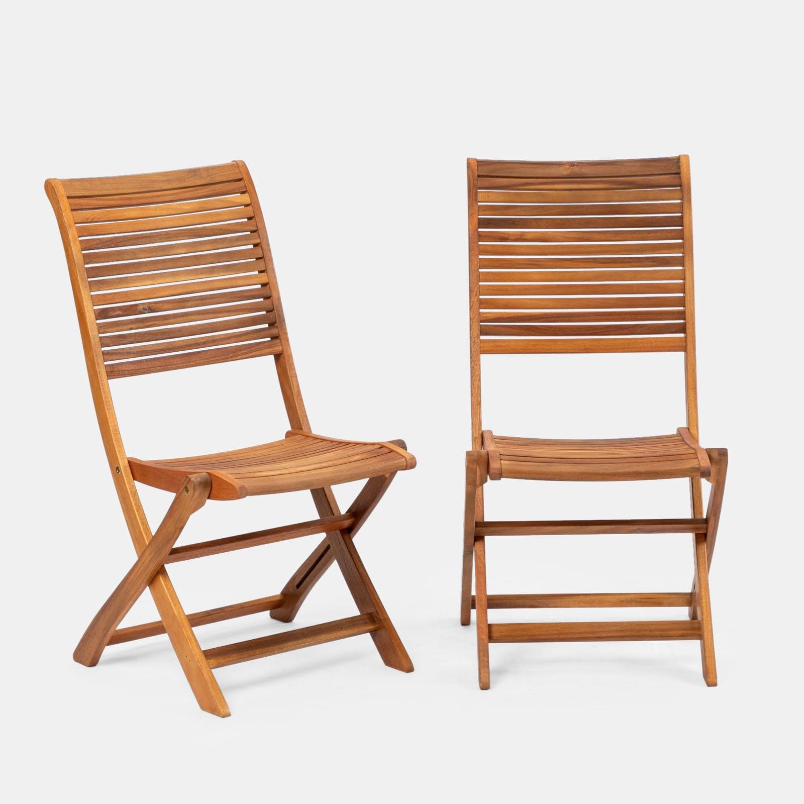 Set pranzo tavolo rotondo 110 cm e 4 sedie pieghevoli in legno di acacia - Paja
