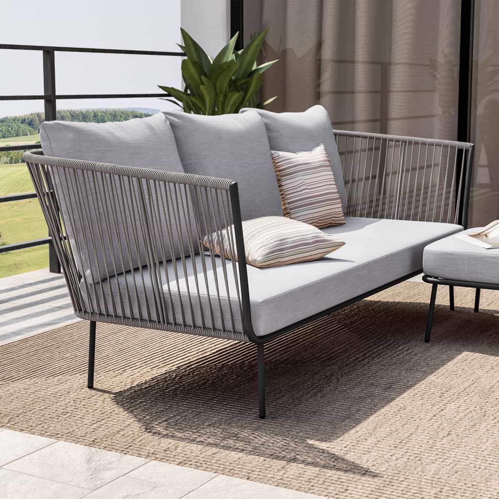 Set relax divano pouf e 2 tavolini in acciaio e polyrattan grigio - Klaus