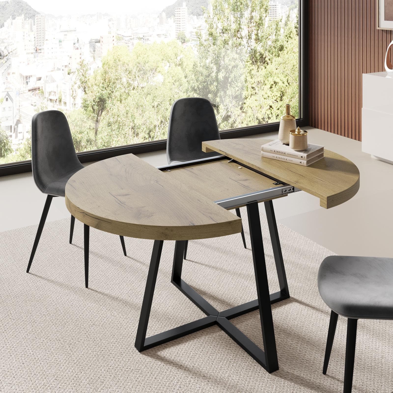 Tavolo da pranzo rotondo allungabile 110-158x110 cm con top rovere nordico e gambe nere - Daina